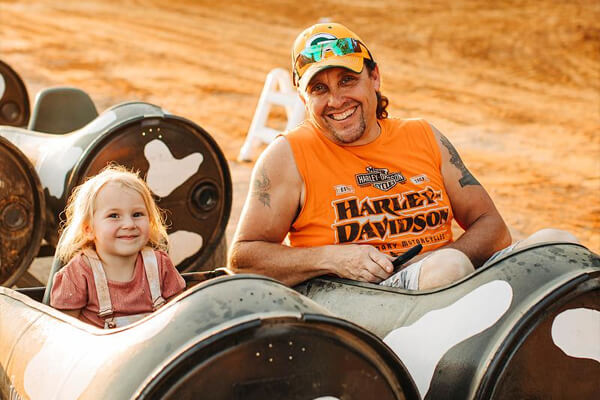 Fall Festival Guests Riding Cow Train
