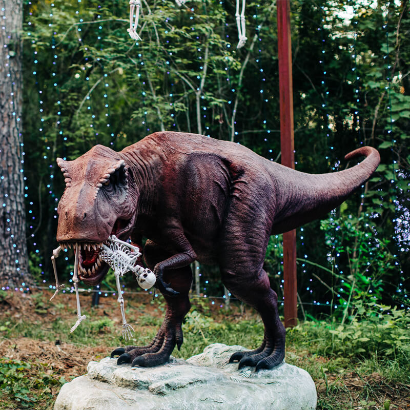 Dinosaur Eating Skeleton
