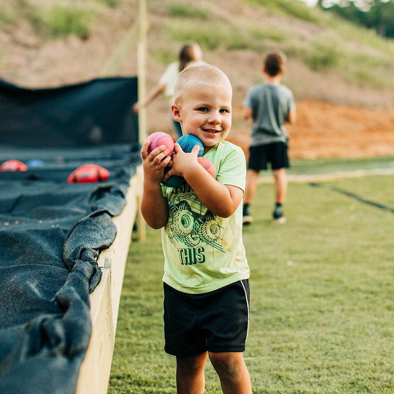 Young Child In Game Area Attraction