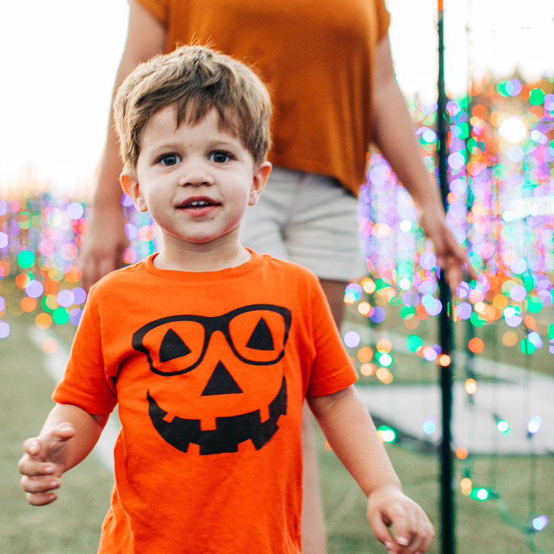 Young Boy In Pumpkin Shir