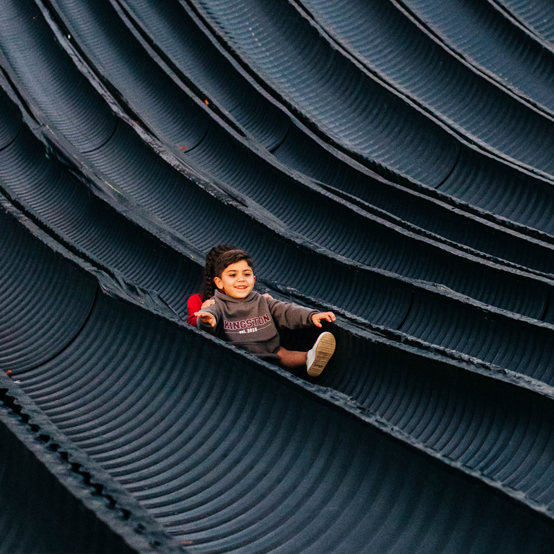 Boy Slides Down Piney Peak Slide