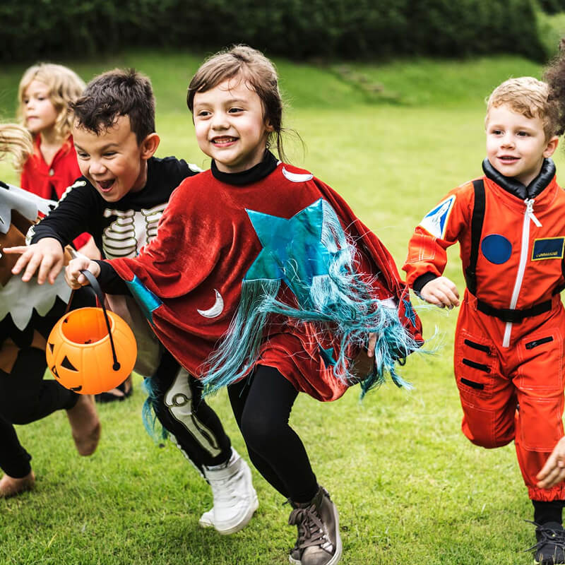Kids Running To Go Trick Or Treating